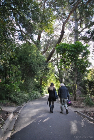 Poets Tamryn Bennett and Bruce Pascoe wandering the Royal Botanic Gardens Victoria